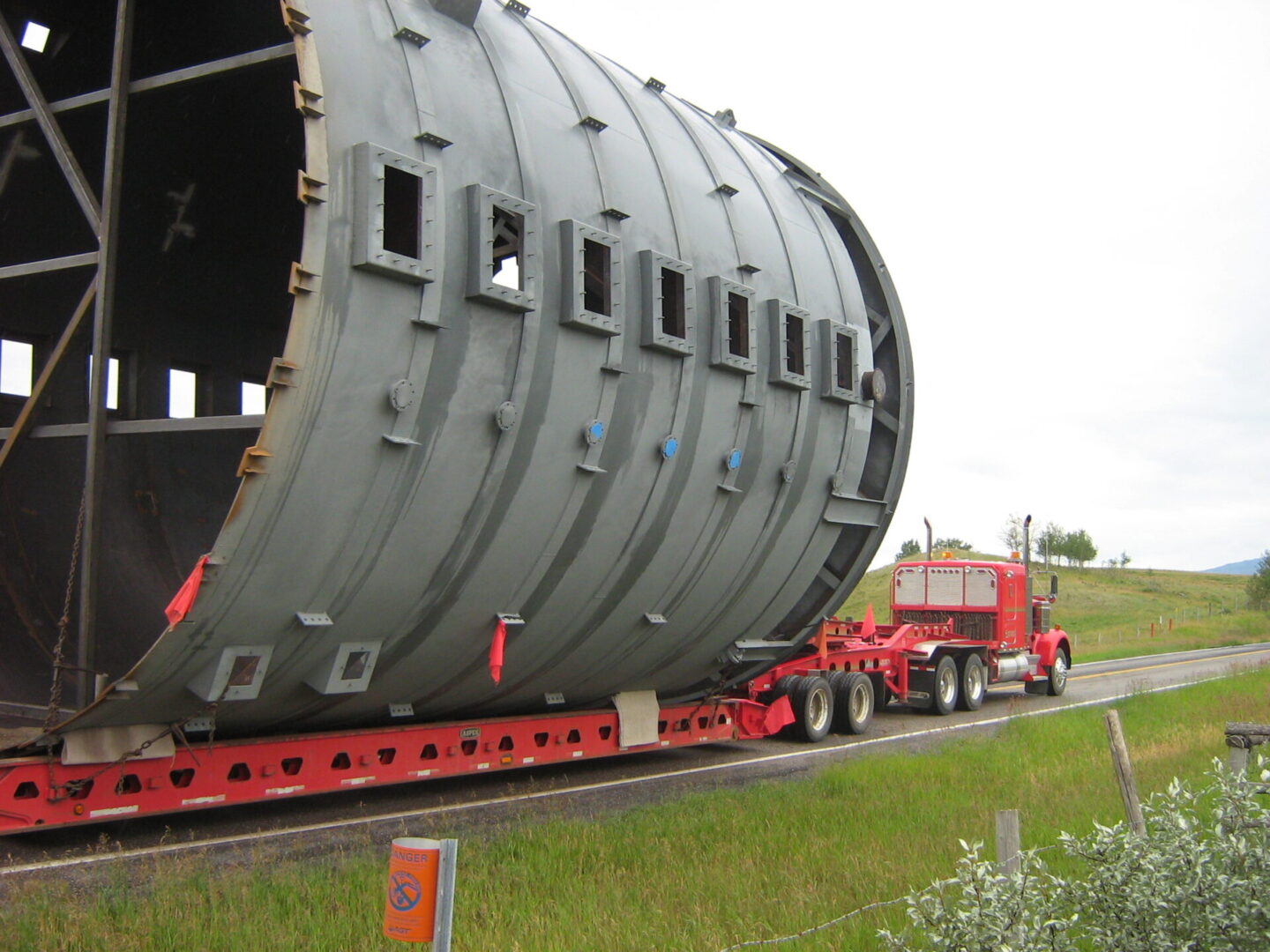 A large gray container on a truck.